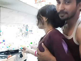 Hot Indian teen with big knockers gets frisky in the kitchen with her boyfriend