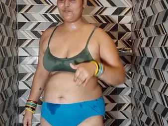 Indian BBW Puma Bhabhi masturbates with her massive inexperienced Bristols while